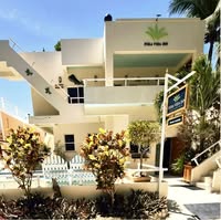 Pura Vida Inn logo