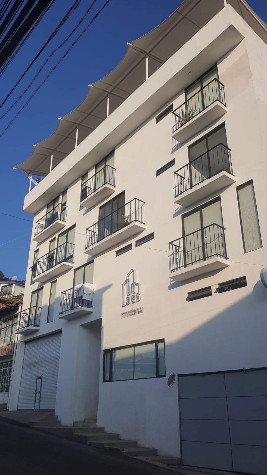 Loes Hotel & Suites cover